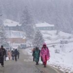 "Frozen Charms: Gulmarg's Snowfall Delights Attract Crowds Anew"