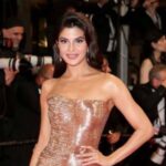 Glamour Unveiled: Jacqueline's Cannes Fashion Triumph