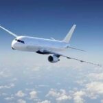 Midair Turmoil: Passenger's Attempt to Open Aircraft Door