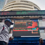 Volatile Day: Sensex Down, Nifty Stays at 24,355