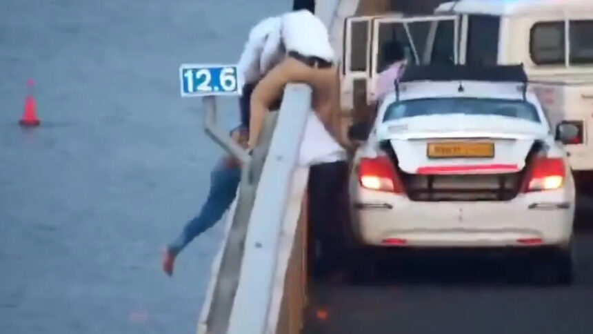 Video of 'superhero' saving woman's life goes viral, she was about to commit suicide from Atal Setu