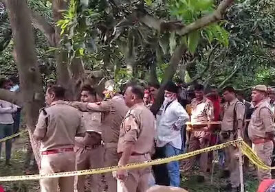 The bodies of two friends were found hanging from a tree in a mango orchard