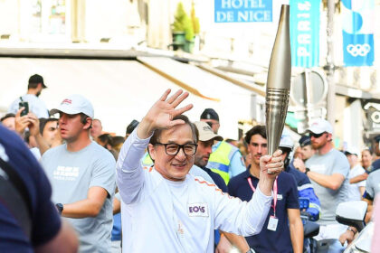 Paris 2024: Jackie Chan Amazes Crowd Holding Paralympic Torch