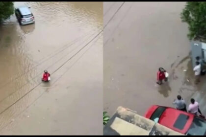 Zomato delivery agent delivers food by walking through flood waters in Ahmedabad