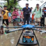 In a first andhra pradesh govt uses drones to distribute food in flood hit areas