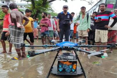 In a first andhra pradesh govt uses drones to distribute food in flood hit areas